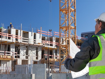 Construction manager looking out for health and safety hazards on a construction site