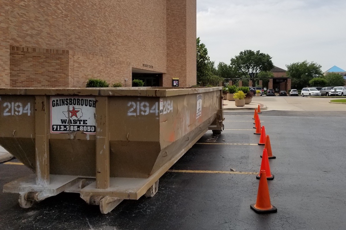 A construction dumpster rental at a construction site in Houston.