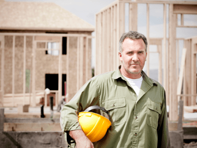 Construction worker wearing a safety helmet at the job site