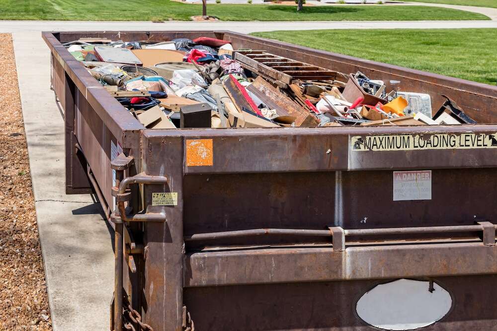 A roll-off dumpster handling construction waste