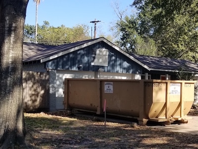 Gainsborough Waste dumpster positioned in the driveway of a residence in Houston, TX